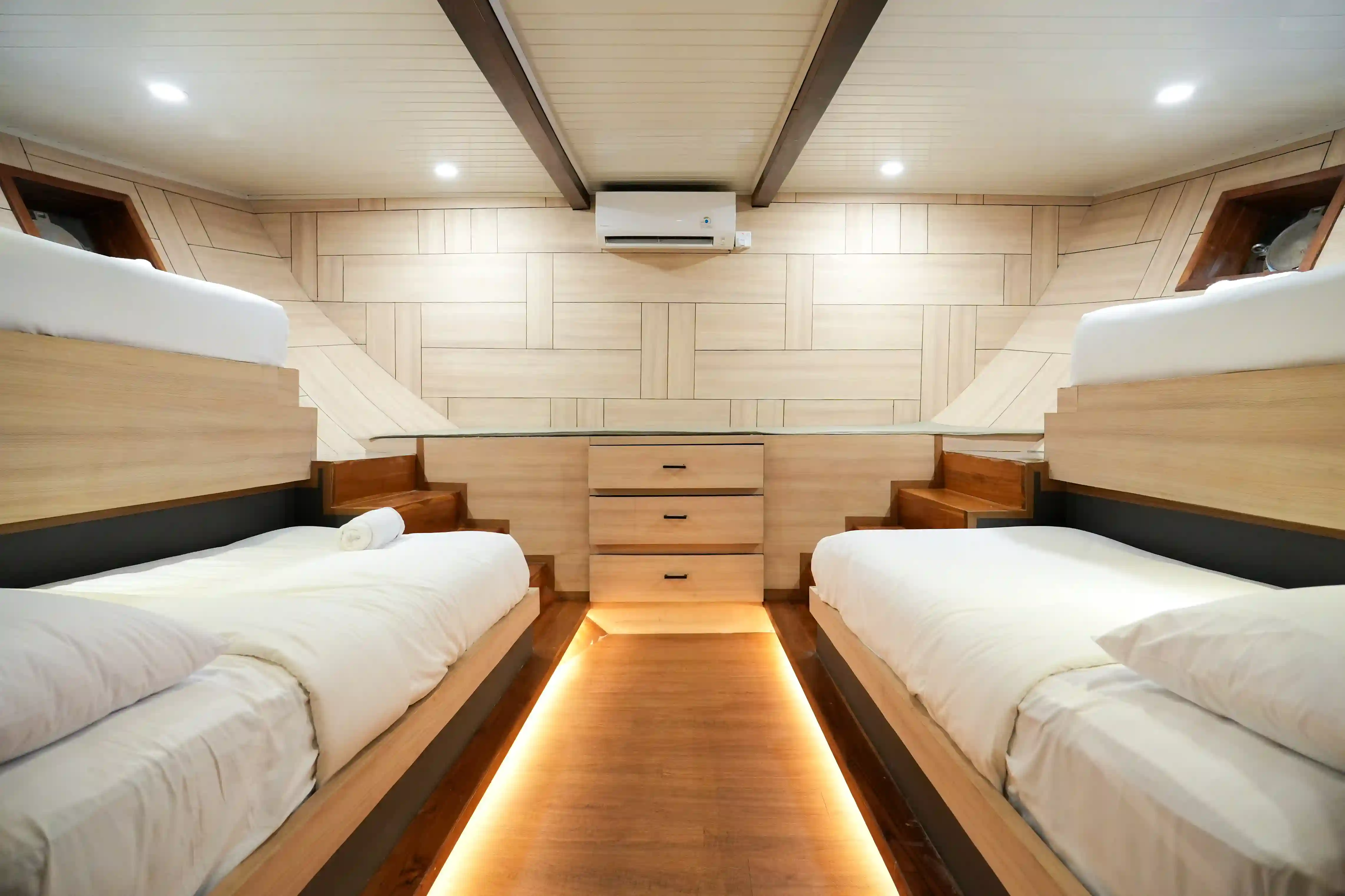 Kelimutu sharing cabin interior aboard Mosalaki Phinisi