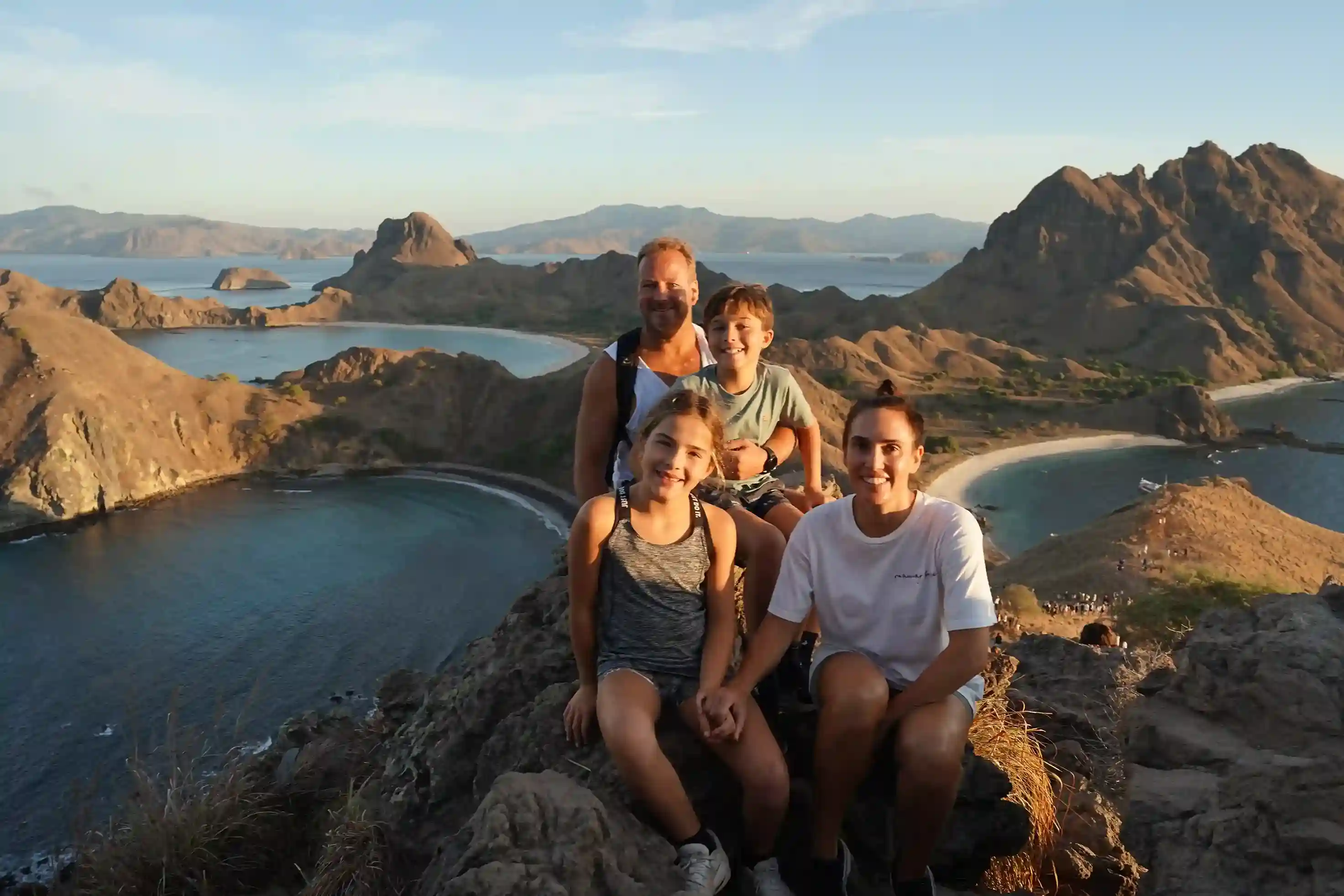 Family trekking to the Padar Island viewpoint